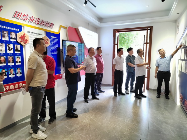 谭光明带队赴民革岳阳市委会调研党员之家建?(1).jpg